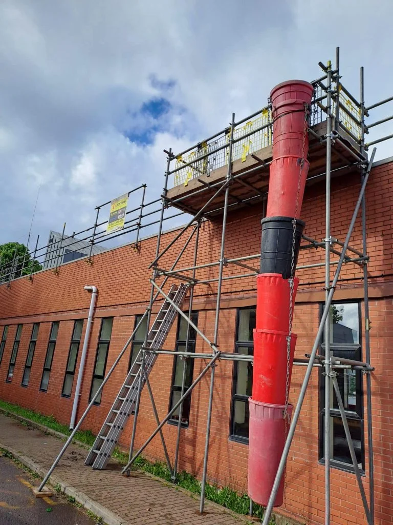 Scaffolding access with safety rails
